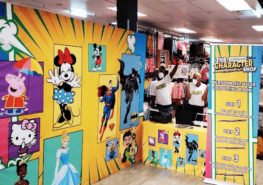 Isilumko-Activate A display of cartoon characters in a marketing store.