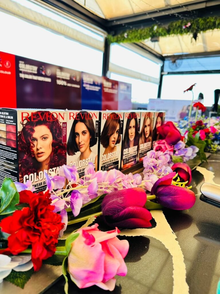 Isilumko-Activate A table adorned with a vibrant assortment of flowers, perfect for marketing ideas aimed at small businesses.
