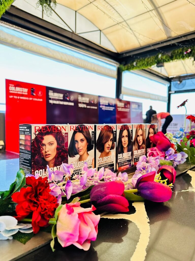 Isilumko-Activate A table adorned with a colorful array of flowers, perfect for marketing a small business or generating creative ideas.