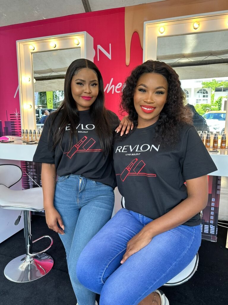 Isilumko-Activate Two women in t - shirts posing for a photo.
